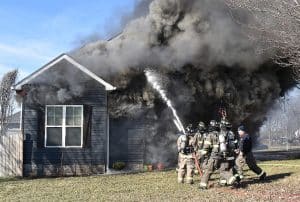 Smithville Firefighters battled a fire at 201 Hayes Street December 27 where the body of 37 year old Brittany Schemmer was found inside. She apparently died from smoke inhalation. (Chris Tramel Photo)