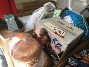 For 15 years God’s Food Pantry has provided food and other essentials to help meet the needs of the medically frail and elderly, children, veterans, the homeless, and the working poor. Last Friday, December 16 was the final regular food distribution before Christmas and families got a little something extra.