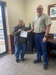 A check for $8,250 from the TVA community care fund, was presented to God’s Food Pantry Director Patricia Zornow, by Smithville Electric System Manager Richie Knowles.