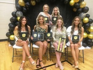 2022 DCHS Football Cheerleader Award Winners: Seated left to right: Reese Williams (Best Dancer), Carlee West (Best Motions and DEAR Award Winner), Hannah Trapp (Most Valuable Cheerleader), Morgan Walker (Best Stunts); Standing left to right: Macy Anderson (Most Spirited) and Ellie Dillard (Best Jumps)