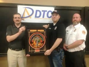 DeKalb County Volunteer Firefighter Anthony Scott of the Main Station (center) received the 2022 DeKalb Telephone Cooperative (DTC) Rookie of the Year Award Saturday night during the annual department awards program. Scott received the award from Nick Nokes of DTC Communications (left) and Captain Brian Williams (right)