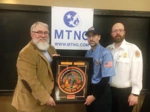 Robert Sartin (center) of the Short Mountain Highway Station is the 2022 Middle Tennessee Natural Gas DeKalb County Volunteer Firefighter of the Year. Sartin received the award Saturday night from Cliff Swoape of MTNG (left) and Assistant DeKalb Fire Chief Anthony Boyd (right)