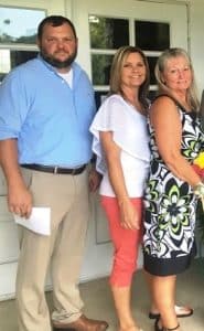 Liberty Alderman Joe D. Bratten, Alderman Kendra Stanford, and Mayor Audrey Martin.