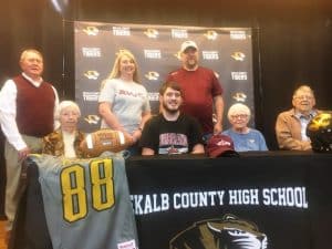 DCHS Senior Tiger punter Nolan Gottlied is about to kick his football career up a notch! The 2022 special teams’ player of the year for the Tigers and the Region 4 Class 4A Most Outstanding Punter, gathered with family, friends, coaches, and fellow players at DCHS Friday to sign a letter of intent to play for Cumberland University after he graduates in May. Pictured here are Nolan and members of his family seated left to right: Peggy Wood, Nolan Gottlied, Mary Gottlied, and John Gottlied. Standing left to right- Dennis Wood, Carrie Gottlied, and Edward Gottlied