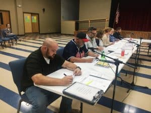 County Commissioners (left to right) Greg Matthews, Tony “Cully” Culwell, Tony Luna, Beth Pafford, Sabrina Farler, Tom Chandler, and Tim Reynolds at previous County Commission Meeting