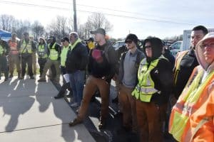 Members of the search and rescue teams receiving final instructions Saturday before beginning search for Brittany Ann Miller