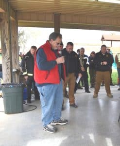 Ric Lee, Pastor of Indian Creek Memorial Baptist Church leads in prayer prior to the search for Brittany Ann Miller Saturday