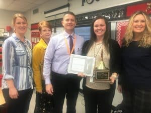 Rachel Desimone, 5th grade teacher and Instructional Coach at DeKalb West School got a surprise visit to her classroom Tuesday for the presentation of the DeKalb West School Teacher of the Year Award. Making the presentation to Desimone was Director of Schools Patrick Cripps, Also on hand for the occasion were as pictured here left to right: DeKalb West Principal Sabrina Farler, Supervisor of Instruction Michelle Burklow, Director Cripps, Ms. Desimone, and Supervisor of Instruction Dr. Kathy Bryant