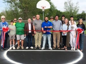 The Smithville Mayor and Aldermen, city employees, and Chamber Director took part in a ribbon cutting for the opening of a new basketball court at Greenbrook Park located at the end of the parking section on the west side across from NHC Healthcare Center.