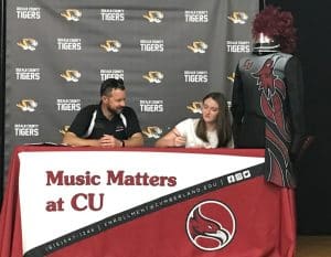 Serenity Burgess has received a $20,000 scholarship from Cumberland University in Lebanon and will become a member of the Phoenix Marching Band, an elite high impact, woodwind, brass and percussion performance group. Burgess made her commitment official in a recent signing at DCHS.