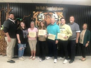 DeKalb County High School on Tuesday presented its final monthly awards of the 2022-23 year for teacher, student, and guardian of the month. These honors were for the month of April. Pictured here left to right are Assistant DCHS Principal Thomas Cagle, Matty Hollingsworth who wrote a winning “Guardian of the Month” essay about her grandmother Kelley Hollingsworth standing next to her, Student of the Month Evelyn Mitchell , Co-Teachers of the Month Coaches Joey Agee and Cody Randolph, DCHS Principal Bruce Curtis, and Assistant DCHS Principal Jenny Norris