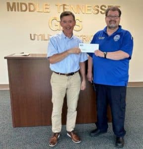 The DeKalb County Ambulance Service recently received a $2,000 donation from Middle Tennessee Natural Gas Utility District through “Project Hometown Help.” Assistant DeKalb EMS Director Trent Phipps accepted the donation on behalf of the ambulance service from Mike Corley, General Counsel for Middle Tennessee Natural Gas.