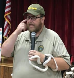 Brad Halfacre, Park Manager at Edgar Evins State Park showed off a live albino king snake and shared interesting facts and information about them during Thursday’s Justin Potter and Alexandria Library Summer Reading Program event at the county complex auditorium