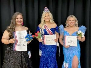 Arista Isabella Rigsby (CENTER) was crowned the 2023 Miss Jamboree in the age 17-20 category Saturday at the county complex auditorium. Rigsby, the 18-year-old daughter of David and Tyroma Rigsby of Lebanon was also awarded for Prettiest Hair. Finishing as first runner-up was 18-year-old Kenlee Renea Taylor (RIGHT), daughter of Ken and Cindy Taylor of Smithville. She was also named Most Photogenic and awarded for Prettiest Eyes. Caley Grace Taylor (LEFT) received second runner-up. She is the 17-year-old daughter of Brandon and Shayna Taylor of Smithville. She was also judged to have the Prettiest Attire.