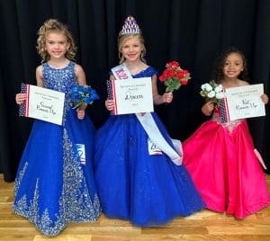 The new Miss Jamboree in the 4 to 6 year old category is Haddeigh Grace Harvey (CENTER). Six years old, Haddeigh is the daughter of Chad and Kayla Harvey of Alexandria. Harvey also won the optional award for Prettiest Attire. First runner-up in the event was Brinleigh Bain (RIGHT), the 5-year-old daughter of Amber Bain of Smithville. Rozlyn Marie Prichard (LEFT) was named 2nd runner-up. She is the 5-year-old daughter of Mark and Amanda Prichard of Smithville. She was also judged Most Photogenic