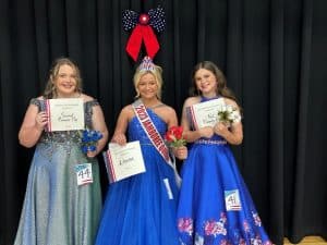 The Miss Jamboree winner of the 11–13-year-old age division in Saturday’s pageant was 12-year-old Kenli Faith Fish (CENTER) and she was also named Most Photogenic along with receiving the award for Prettiest Attire. She is the daughter of Cody Fish and Tiffany Pedigo of Smithville. 12-year-old Cora Marie Cox (RIGHT) daughter of Brandon and Whitney Cox of Smithville was the 1st runner-up. Savannah Faith Stibil (LEFT) received 2nd runner-up. She is the 13-year-old daughter of John and Glenda Stibil of Smithville. She also won the optional award for Prettiest Hair.