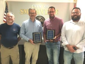 Smithville Mayor Josh Miller and Alderman Shawn Jacobs last Monday commended members of the city’s airport advisory board for their leadership and presented two of them, Chairman Roth Terrell and member Josh Williams plaques in appreciation for their service. Alderman Jacobs, who is also a member of the airport board, presented the plaques to Terrell and Williams which read” For your sincere and loyal dedication shown to the Smithville Airport. Rejuvenated and rekindled are we for knowing and working with you. Thank you for everything you have done”