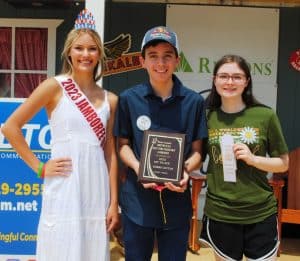 *Dobro Guitar: First Place-Noah Goebel of Elkton, Kentucky (CENTER) Second Place-Tyler Andal of Nashville (NOT PICTURED) Third Place-Amelia Brown of Springfield (RIGHT) Miss Jamboree Queen Keara McKinsey Milligan (Left)