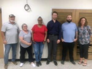 The DeKalb County Election Commission pictured here with the newly selected Administrator of Elections Dustin Estes. Shown left to right: Commissioners Ron Sifford, Kim Luton, Yvette Carver, Administrator of Elections Estes, Commission Chairman Brandon Gay, and Commissioner Loree Hall