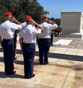 Bill Rutherford of DeKalb County, Commandant of the Marine Corps League Detachment 1377, was part of a four-man detail from that league recently invited to lay a wreath at the Tomb of the Unknown Soldier at Arlington National Cemetery in Washington DC during a special ceremony held on Saturday, September 2. Photo here shows group standing at attention and saluting after the wreath is placed