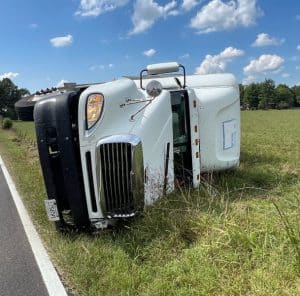 A truck driver escaped injury in a roll over crash of his semi last Thursday on Allens Ferry Road (Jim Beshearse Photo)