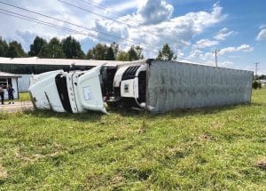 Semi Driver Escapes Injury in Rollover Crash (Jim Beshearse Photo)