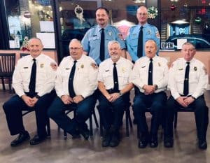 Veteran leaders of the Smithville Fire Department: Seated left to right: Assistant Chief Jeff Wright (38 years of service), Deputy Chief Hoyte Hale (39 years). Chief Charlie Parker (44 years including 32 years as Chief), Captain Danny Poss (44 years), and Captain Donnie Cantrell (44 years). Standing left to right- Greg Bess (Photographer)-29 years, and William (Wink) Brown-26 years