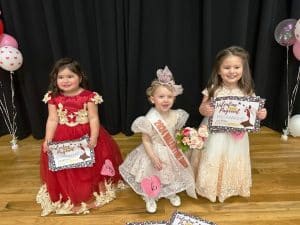 Valentine Pageant Saturday: The winner of the age 25- 48-month category was Elsie Pearl Paschal of Alexandria ( pictured center), the 28-month-old daughter of Justin and Makagan Paschal. Elsie was also judged to have the prettiest attire. Runners-up in this event were 1st- Sophie Grace Torres (right) of Smithville, 3-year-old daughter of Jose Torres and Brooke Bain; and 2nd-Ruby Soto Perez of Smithville (left), 3-year-old daughter of Macrina Perez Martinez. Sophie Grace Torres was judged to have the prettiest hair while Ruby Soto Perez was awarded for prettiest smile.