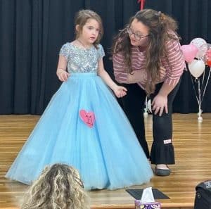 Valentine Pageant Saturday: Optional winner in the 4-6 year old category: Serenity Carmen Tiner of Smithville, 5-year-old daughter of Billy and Stephanie Tiner was deemed to have the prettiest attire. She is pictured here with her mother.