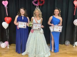 Valentine Pageant Saturday: Kenli Faith Fish of Smithville (pictured center) won the crown in the 13-15 year old category. She is the 13 year old daughter of Tiffany Pedigo and Cody Fish. Kenli is a 7th grader at DeKalb Middle School. Fish was judged to have the prettiest eyes, hair, and attire, and was named Most Photogenic. Runners-up in this category were 1st-Karah Jo Ford of Smithville (right), 13 year old daughter of Amanda Ford and Hector O’Roscoe; and 2nd Ellabeth Jane Ferrell of Smithville (left), 14 year old daughter of Steven Ferrell and Amy Ferrell. Karah Jo Ford was judged to have the prettiest smile.