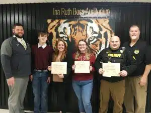 DeKalb County High School Thursday recognized its staff member, student, and parents of the month for January. Pictured left to right: DCHS Assistant Principal Thomas Cagle, 9th grader and essay winner Colton Crow with his mother and parent of the month Candace Garrett, Student of the Month Kathryn Hale, Staff member of the Month SRO Sergeant Chris McMillen, and DCHS Principal Bruce Curtis.