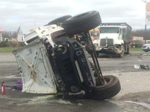 A child not yet two years old was airlifted after a crash Thursday on Highway 70 near DeKalb Market. According to the Trooper Chris Delong of the Tennessee Highway Patrol, 41-year-old Amanda Maples of Walling and her young child were traveling west in a 2016 Jeep Wrangler when the driver of another vehicle in front of them stopped to remove some debris in the roadway. Because of that, Maples slowed but a 2008 Kenworth commercial truck behind her did not stop in time and rear-ended the Jeep forcing the Wrangler to overturn. The truck, belonging to 5 Star Disposal, was driven by 45-year-old Christopher Finch of Shelbyville who was hauling a dumpster. (The Kenworth truck is shown here in the background)