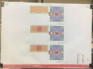 John Eisenlau of Treanor HL architects showed design options for new jail/judicial center to the county’s jail committee/county commission during a meeting Monday night. Eisenlau said it is conceivable to build up to a four-story facility adjacent to the east side of the jail annex (as design for courtooms and inmate housing shows here) on property the county already owns but that it would need more than one floor to accommodate housing for up to 225 inmates and as many as four courtrooms.