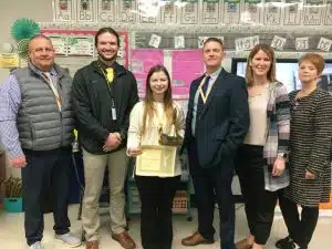 Crystal Barnes, the school level Teacher of the Year at DeKalb West School, was visited in her classroom Tuesday morning by Principal Sabrina Farler, Director of Schools Patrick Cripps, Supervisor of Instruction Randy Jennings, Assistant Principal Seth Willoughby and Supervisor of Instruction Michelle Burklow who presented her with a school bell award, a floral arrangement, and a certificate granting her a day off from school with pay.