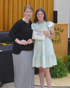 Principal Sabrina Farler stands next to Perfect Attendance winner Autumn Crook.