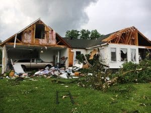 Tornado damage in May at rear of Joe and Polly Payne home on North Congress Boulevard