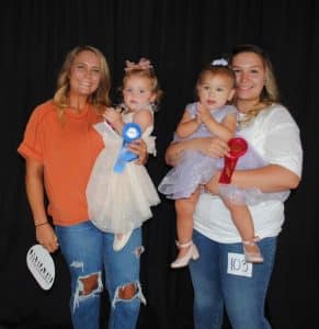 DeKalb Fair Toddler Show-Girls (19 to 24 months) Winner: Callie Blake Roller (pictured left), 21 month old daughter of George and Abbey Roller of Smithville; Runner-up: Oaklynn Coronado (pictured right), 20 month old daughter of Kaia and Diego Coronado of Smithville