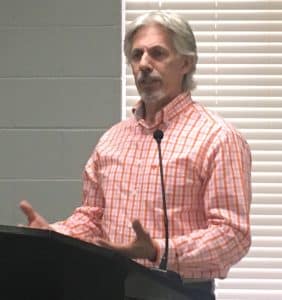 Walnut Street Merchants Seeking Solutions to Keep Jamboree Craft Vendors from Blocking Access to Their Storefronts. Rick Walker, owner of the Arts Garage on West Walnut Street, shown here addressing the mayor and aldermen Monday night