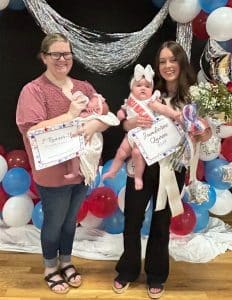 Jamboree Pageant- Winners of girls 1 day to 6 months: Queen Dallas Cove Ellis (pictured right), 6-month-old daughter of Austin and Briana Ellis of Smithville. She was also awarded for Prettiest Smile and Eyes. Charlotte Cay Koelle (pictured left) was the runner-up. She is the 4-week-old daughter of Heather and Christian Koelle of Smithville. She received honors for Prettiest Hair, Attire, and Most Photogenic