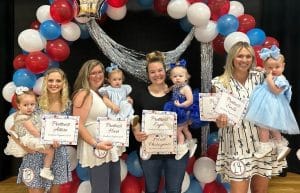 Jamboree Pageant: Girls 13-24 months: left to right- Prettiest Attire- Amora Joy Perez, 20-month-old daughter of Andres and Monica Perez of Smithville; Prettiest Hair- Parker Kayte Harvey, 17-month-old daughter of Chad and Kayla Harvey of Alexandria; Prettiest Eyes and Most Photogenic- Corie Smith, 16-month-old daughter of Jesse and Chloe Smith of Smithville; Prettiest Smile and People’s Choice- Indy Hart Williams, 16-month-old daughter of Brian and Stephanie Williams of Smithville.