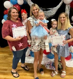 Jamboree Pageant: Girls 13-24 months: Queen Indy Hart Williams (pictured center), 16-month-old daughter of Brian and Stephanie Williams of Smithville. She was also awarded for Prettiest Smile and People’s Choice. Amora Joy Perez (pictured right), 20-month-old daughter of Andres and Monica Perez of Smithville received first runner-up and the Prettiest Attire award. Second runner-up went to Aeriel Rae Key (pictured left), 19-month-old daughter of Will and Shana Key of Smithville.