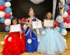 Miss Jamboree Pageant: 4–6 year-old age group: Queen Brynlee Allana Rankhorn (pictured center), the 5-year-old daughter of Jacob and Ashlee Rankhorn of Rock Island. She was also awarded for Prettiest Smile; Brinleigh Bain (pictured right), 6-year-old daughter of Amber Bain of Smithville was first runner-up. Second runner-up went to Jazmin Perez (pictured left), 4-year-old daughter of Joel Perez and Blanca Jones of Smithville.