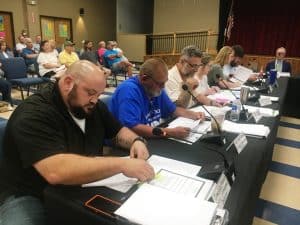 Pictured left to right: County Commissioners Greg Matthews, Tony (Cully) Culwell, Tony Luna, Beth Pafford, Sabrina Farler, Mathias Anderson and Tom Chandler (blocked from view)