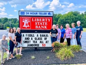 Chamber’s “Jamboree Project Welcome Mat” Winners – 2024: Most Creative – Liberty State Bank - A Fiddle, A Banjo, and a Glass of Sweet Tea, All at Jamboree 53