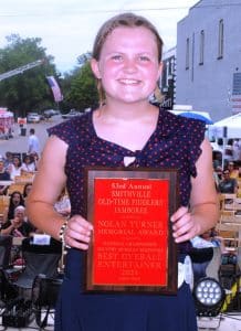 Callie Doerfel of Murfreesboro was winner of the Nolan Turner Memorial Entertainer of the Year award. The honor is presented to the best overall instrumental entertainer among winners in the dobro guitar, mandolin, five string banjo, and flat top guitar competition. Turner, who died in October 2017, was a long time Fiddlers’ Jamboree supporter and photographer. Doerfel earned first place in the five string banjo competition and she took second place in both flat top guitar and dobro guitar. Doerfel was also a second place winner in the beginner duck dancing and clogging contests.