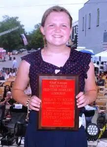 Callie Doerfel of Murfreesboro was winner of the Nolan Turner Memorial Entertainer of the Year award. The honor is presented to the best overall instrumental entertainer among winners in the dobro guitar, mandolin, five string banjo, and flat top guitar competition. Turner, who died in October 2017, was a long time Fiddlers’ Jamboree supporter and photographer. Doerfel earned first place in the five string banjo competition and she took second place in both flat top guitar and dobro guitar. Doerfel was also a second place winner in the beginner duck dancing and clogging contests.