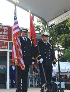 Assistant Chief Jeff Wright and Captain John Poss of the Smithville Fire Department presented colors during Friday night’s opening ceremony of the Fiddlers Jamboree and Crafts Festival