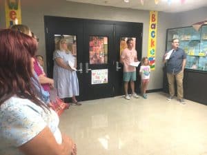 Isaac Gray, Minister of the Smithville Cumberland Presbyterian Church leading prayer at Smithville Elementary School Sunday. Similar prayer events were held at the same time at each of the other schools in the county led by ministers of the DeKalb County Ministerial Association.