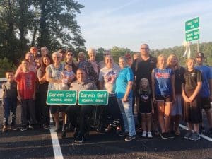 Family of the late Darwin Gard gathered at Sligo bridge for a brief but special ceremony Tuesday evening to pay tribute to the man affectionately known as the “King of Center Hill” for his decades of service operating Sligo Marina.