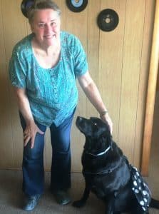 Helga Thompson and her dog Max help Brighten Saturdays for Residents at NHC